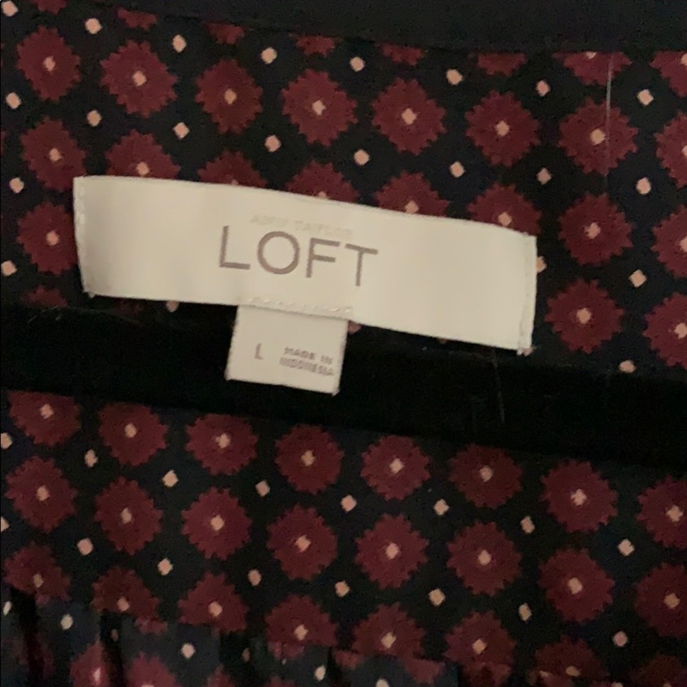 Navy blue with maroon dots